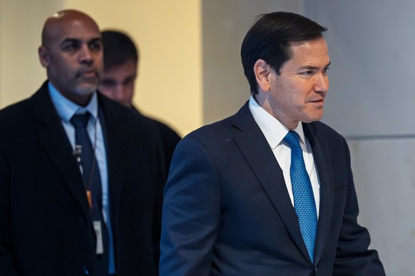 Secretary of State Marco Rubio arrives to join Defense Secretary Pete Hegseth in a secure room in the basement of the Capitol to brief lawmakers on the military strike on a suspected drug smuggling bo ...