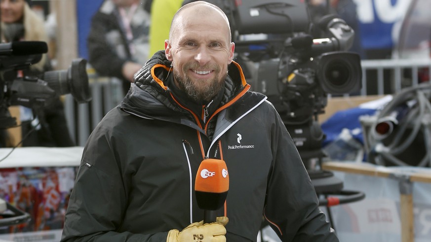 TV ski expert and former ski racer Marco Buechel of Liechtenstein poses in the finish area, after the Downhill race of the FIS Alpine Ski World Cup season at the Lauberhorn, in Wengen, Switzerland, Sa ...