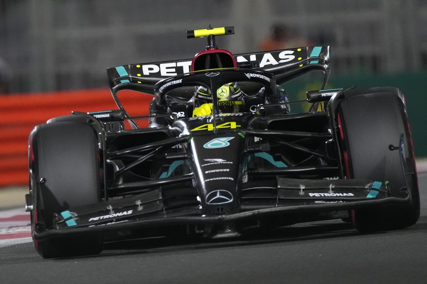 FILE - Mercedes driver Lewis Hamilton of Britain steers his car during qualifying session ahead of the Abu Dhabi Formula One Grand Prix at the Yas Marina Circuit, Abu Dhabi, UAE, Saturday, Nov. 25, 20 ...