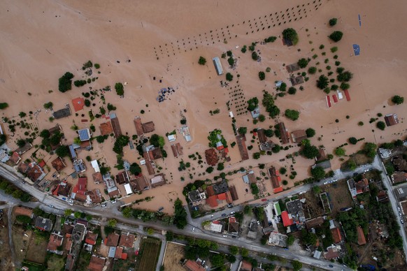 epa10846852 A photograph taken with a drone shows a flooded area during the storm &#039;Daniel&#039;, in Piniada village, near Trikala, Thessaly, Greece, 07 September 2023. At least six people died an ...