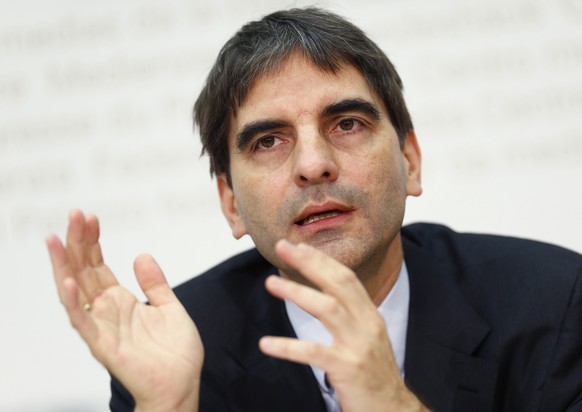 Economist Aymo Brunetti, head of the expert panel, speaks to the media during a news conference in Bern December 5, 2014. UBS and Credit Suisse should be subject to a higher leverage ratio, the broade ...