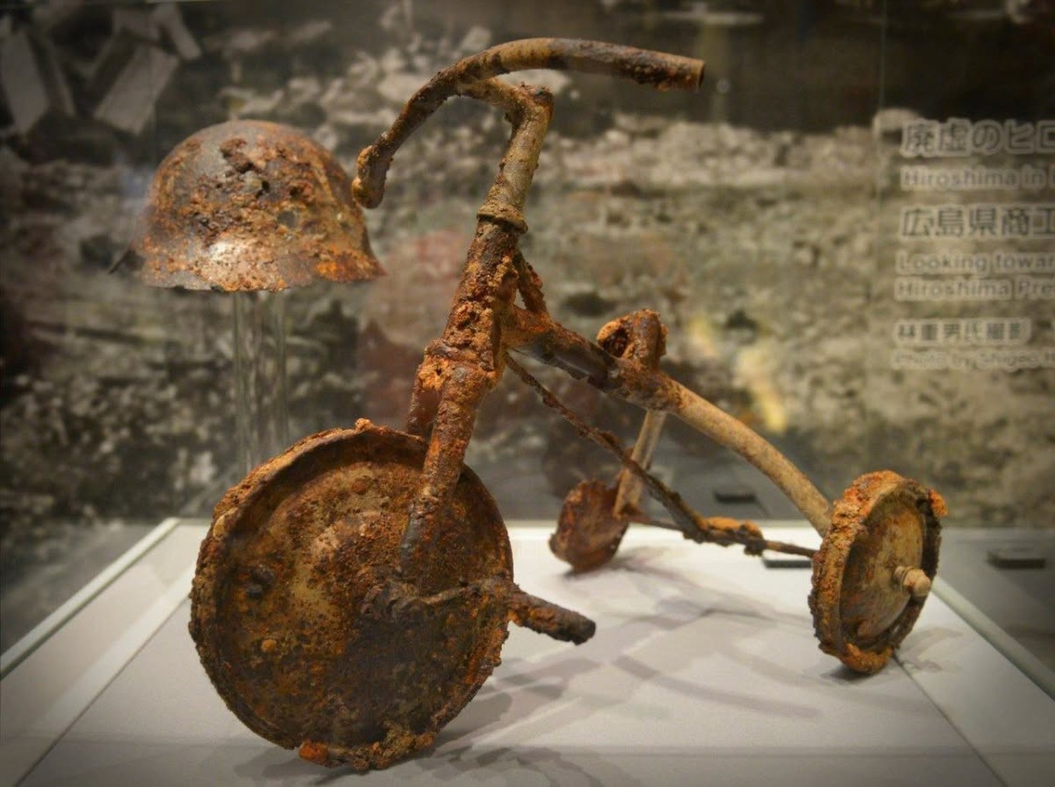 This small, rusted tricycle belonged to a 3-year-old boy named Shinichi Tetsutani, who lived in Hiroshima, Japan.

On the morning of August 6, 1945, Shinichi was riding this tricycle in his yard when  ...