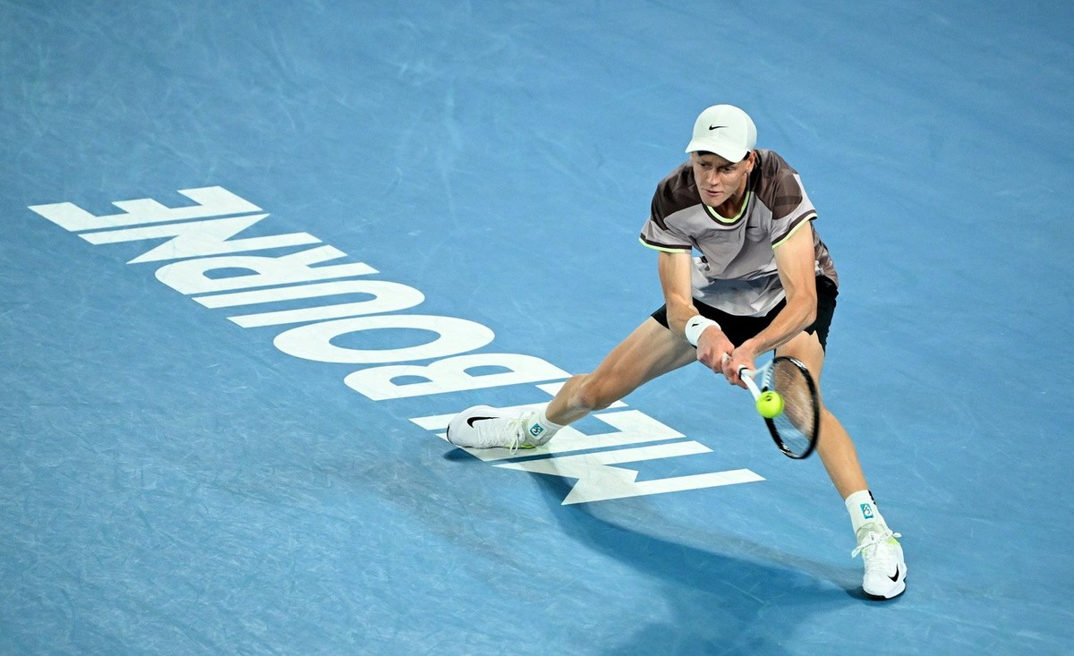 epa11110072 Jannik Sinner of Italy in action during the Men's Singles final against Daniil Medvedev of Russia on Day 15 of the Australian Open tennis tournament in Melbourne, Australia, 28 Januar ...
