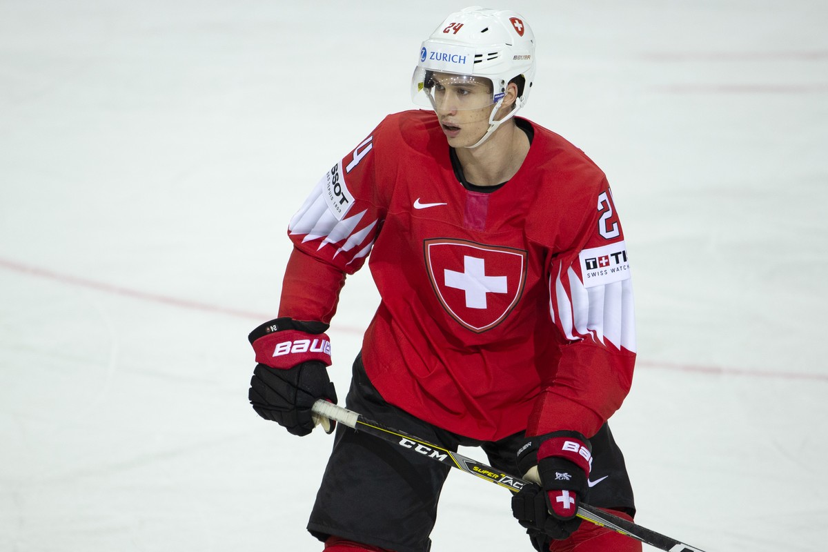 Switzerland's defender Tobias Geisser look his teammates, during the IIHF 2021 World Championship preliminary round game between Switzerland and Slovakia, at the Olympic Sports Center, in Riga, L ...