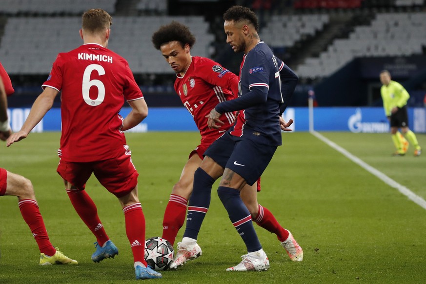 PSG&#039;s Neymar, right, challenges for the ball with Bayern&#039;s Leroy Sane, center, and Bayern&#039;s Joshua Kimmich, left, during the Champions League, second leg, quarterfinal soccer match betw ...
