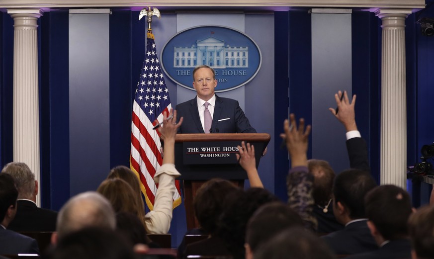 Reporters call on White House press Secretary Sean Spicer during the daily White House briefing, Monday, Jan. 23, 2017, in the briefing room of the White House in Washington. (AP Photo/Pablo Martinez  ...