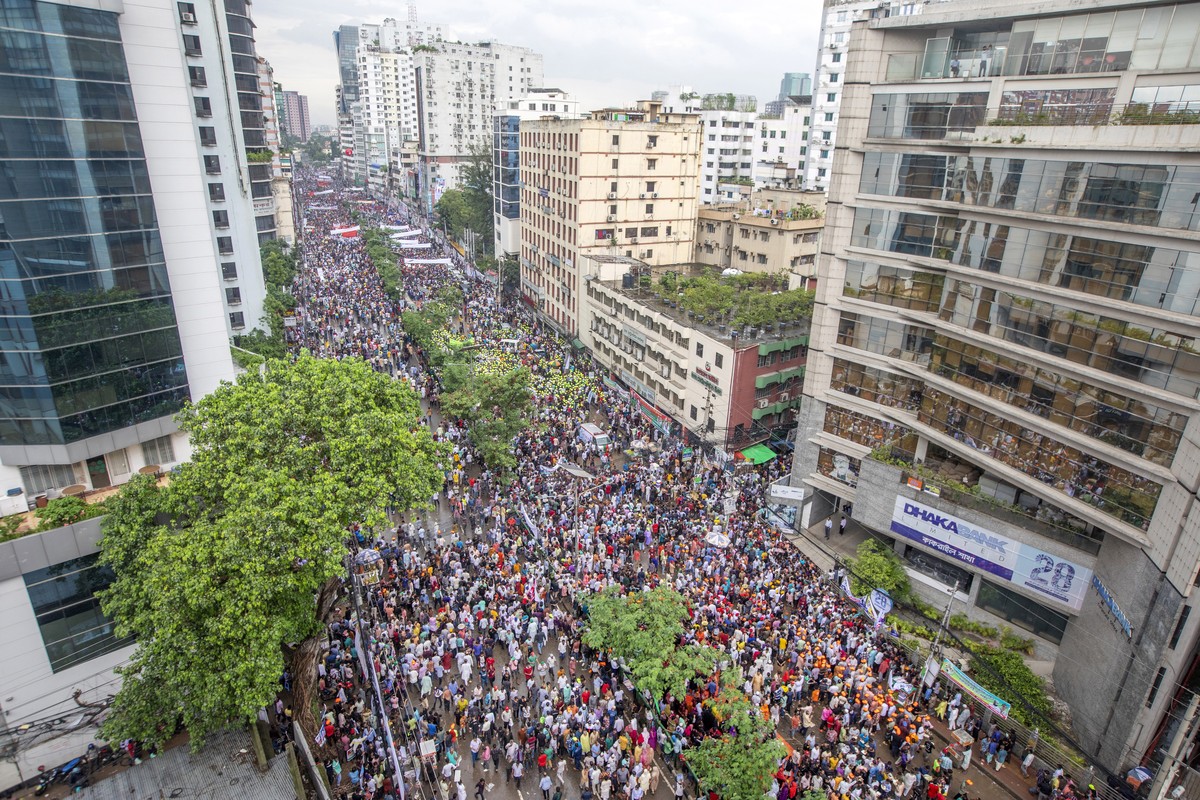 epa10741646 Supporters of the opposition Bangladesh Nationalist Party (BNP) attend a mass rally in front of their Nayapaltan office in Dhaka, Bangladesh, 12 July 2023. The BNP said thousands gathered  ...