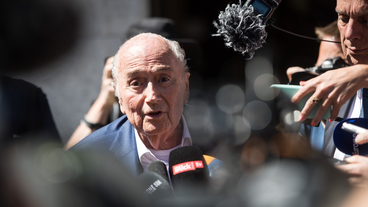 The former Fifa President, Joseph Blatter, center, surrounded by media representatives, speaks to the press in front of the Swiss Federal Criminal Court in Bellinzona, Switzerland, at the last day of  ...