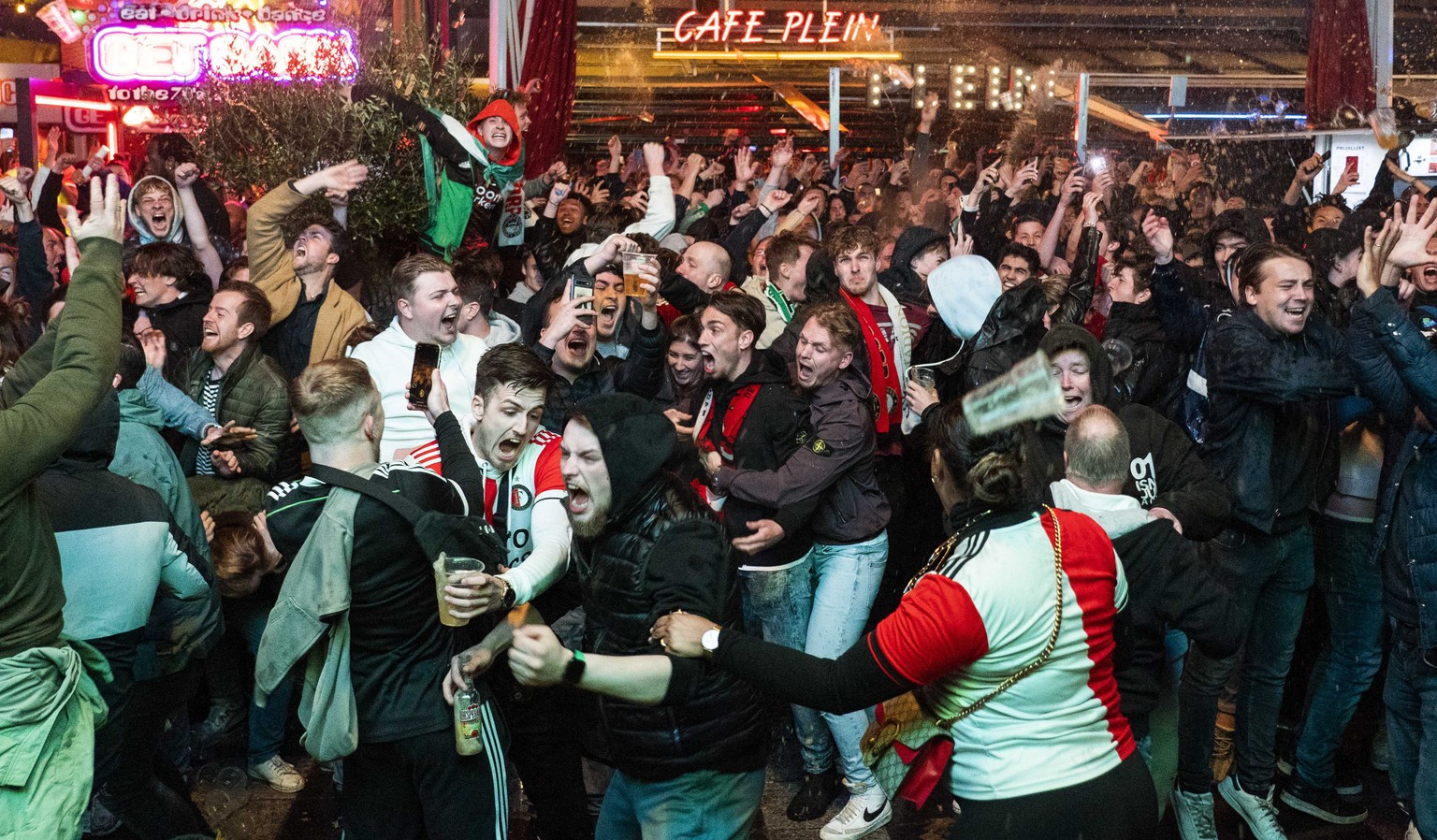epa09929435 Supporters of Feyenoord cheer at Stadhuisplein after winning the UEFA Conference League semifinal, second leg soccer match against Olympique Marseille, in Rotterdam, Netherlands, 05 May 20 ...