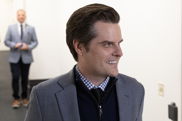 epa10915587 Republican Representative of Florida Matt Gaetz departs from a meeting of the House Republican Conference to discuss the vacant position of Speaker of the House, on Capitol Hill in Washing ...