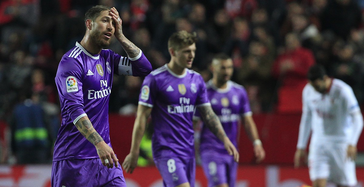 Real Madrid's Sergio Ramos, left, gestures during La Liga soccer match between Real Madrid and Sevilla at the Ramon Sanchez Pizjuan stadium, in Seville, Spain on Sunday, Jan. 15, 2017. (AP Photo/ ...