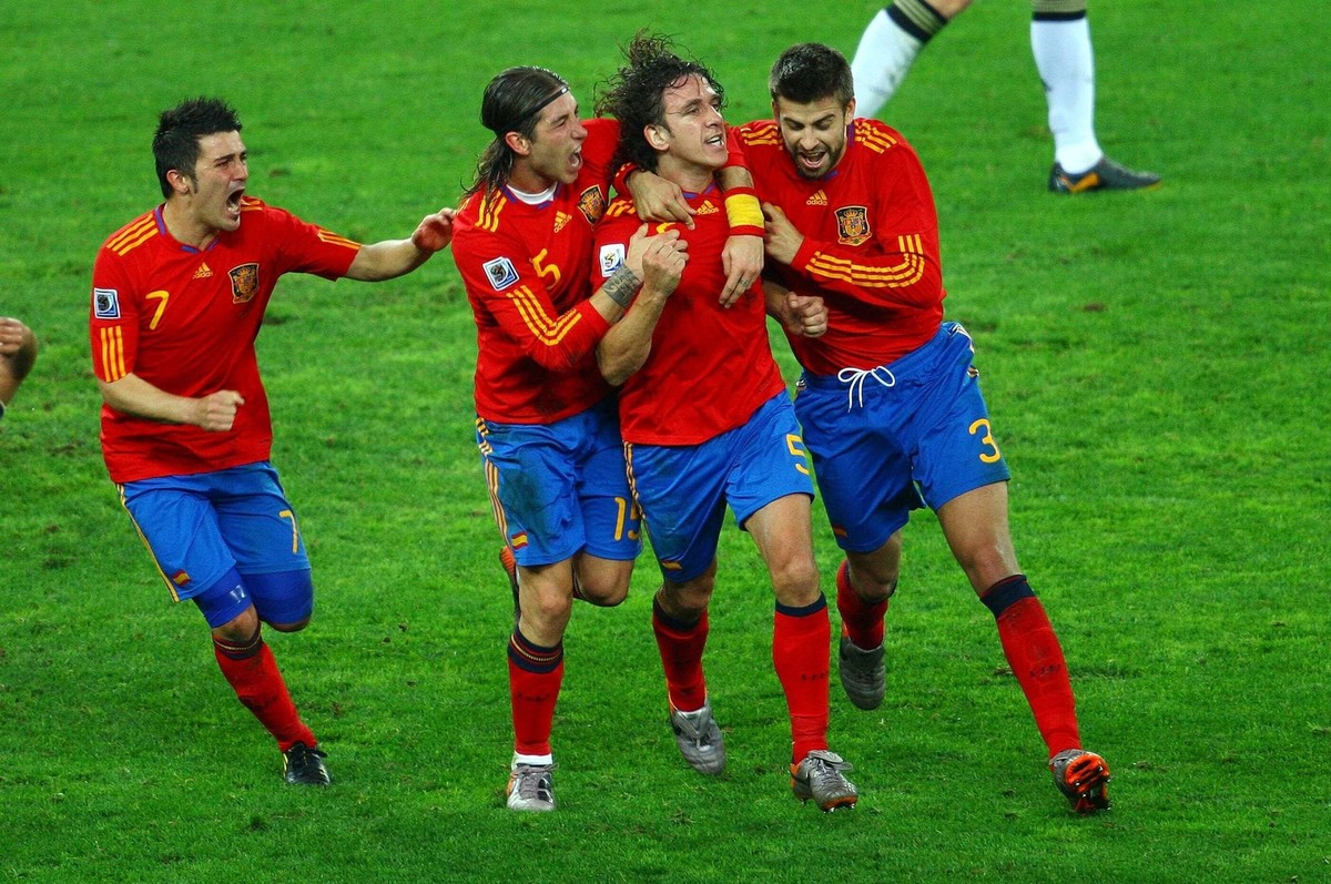 AFRCIA WC PUYOL SOCCER/FUTBOL WORLD CUP 2010 SEMIFINAL ALEMANIA VS ESPANA Action photo of David Villa 7 Sergio Ramos 15 Carles Puyol 5 and Gerard Pique 3 of Spain celebrating a goal, during semi final ...