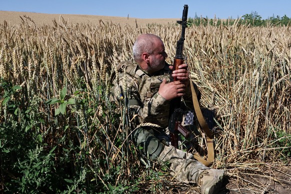 In this photo provided by Ukraine's 65th Mechanized Brigade press service, a soldier practices military skills at a training ground near the frontline in the Zaporizhzhia region, Ukraine, Sunday, ...