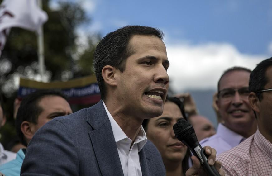 Venezuela&#039;s self-declared interim leader Juan Guaido speaks to supporters in a public plaza in Las Mercedes neighborhood of Caracas, Venezuela, Saturday, Jan. 29, 2019. Venezuela&#039;s political ...