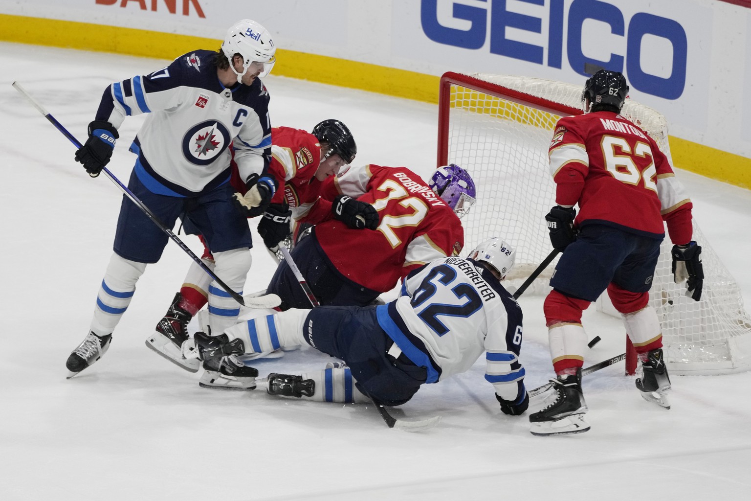 Winnipeg Jets right wing Nino Niederreiter (62) scores a goal against Florida Panthers goaltender Sergei Bobrovsky (72) during the first period of an NHL hockey game, Friday, Nov. 24, 2023, in Sunrise ...