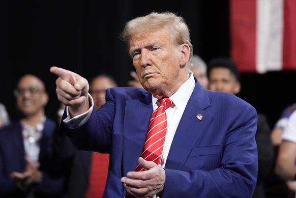 Republican presidential nominee former President Donald Trump gestures at a campaign event at the Cobb Energy Performing Arts Centre, Tuesday, Oct. 15, 2024, in Atlanta. (AP Photo/Alex Brandon)
Donald ...