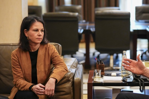 German Foreign Minister Annalena Baerbock listens to Lebanese Prime Minister Najib Mikati during their meeting in Beirut, Lebanon, Wednesday, January 10, 2024. (AP Photo/Hassan Ammar) A…