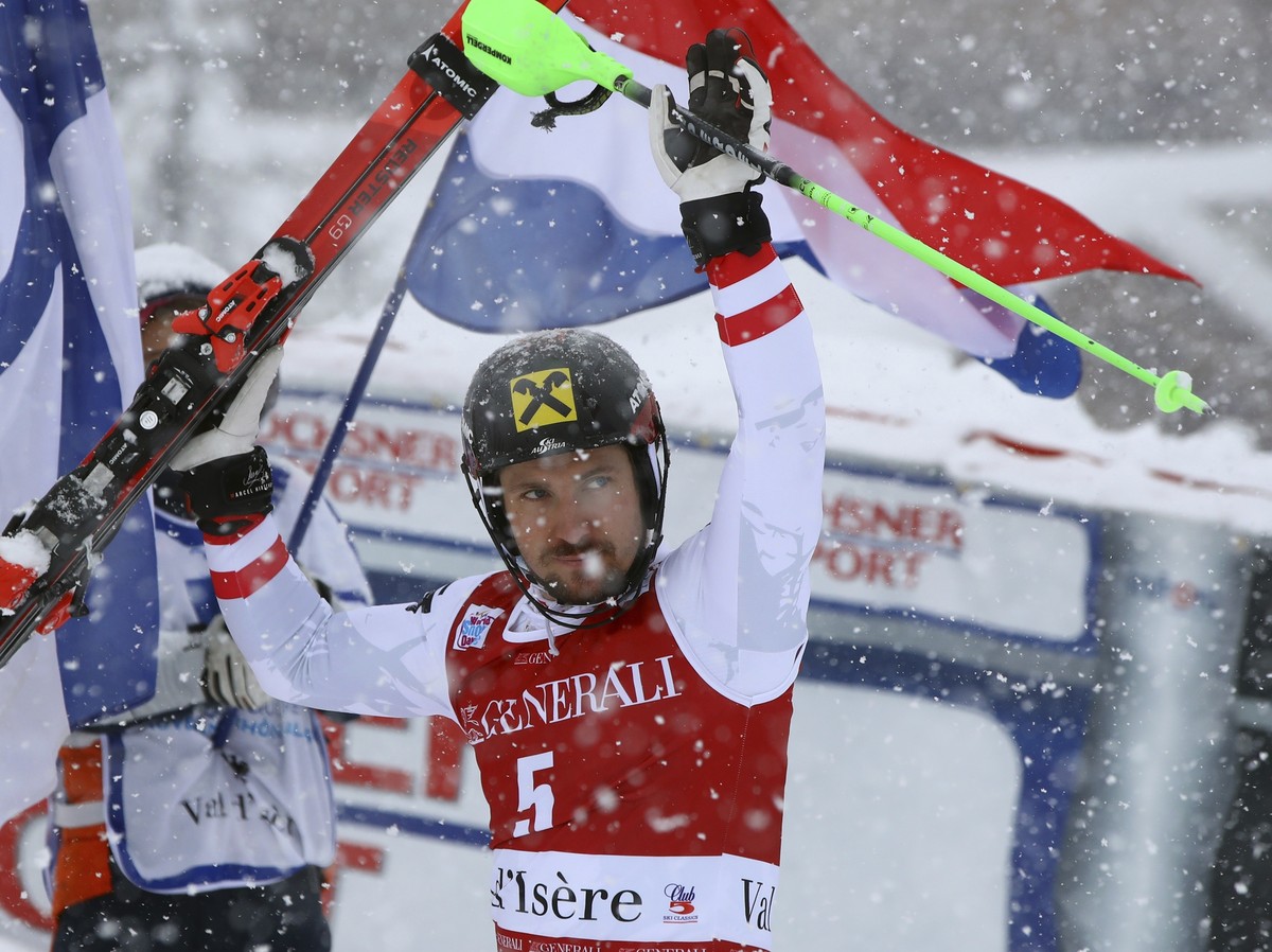 Austria's Marcel Hirscher celebrates after winning an alpine ski, men's World Cup slalom, in Val D'Isere, France, Sunday, Dec. 10, 2017. (AP Photo/Alessandro Trovati)