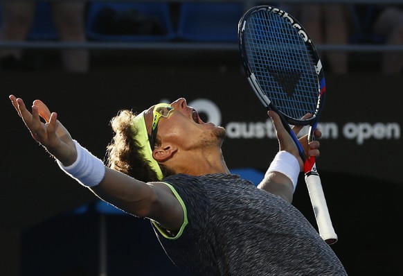 Tennis - Australian Open - Melbourne Park, Melbourne, Australia - 21/1/17 Uzbekistan&#039;s Denis Istomin celebrates winning his Men&#039;s singles third round match against Spain&#039;s Pablo Carreno ...