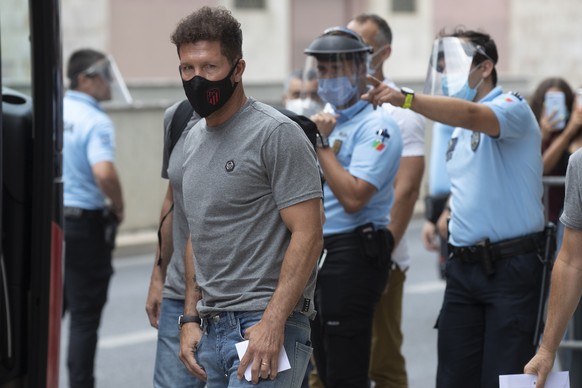 Atletico&#039;s Madrid Diego Simeone arrives to the team hotel in Lisbon, Portugal, Tuesday, Aug. 11, 2020. Atletico are scheduled to play Leipzig in a Champions League Quarter Final soccer match on T ...