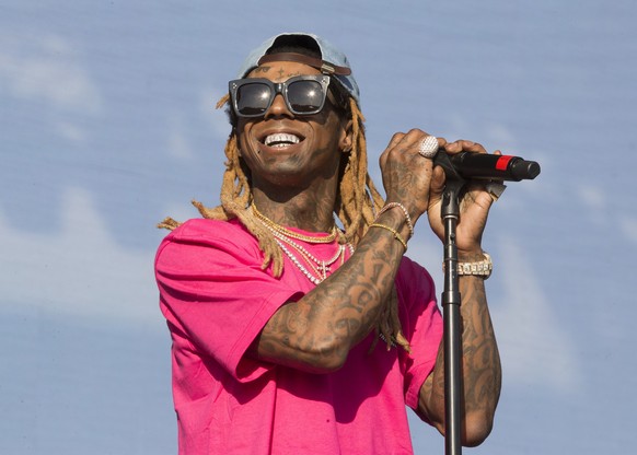 FILE - In this Saturday, June 16, 2018 file photo, Lil Wayne performs on Day 3 of the 2018 Firefly Music Festival at The Woodlands in Dover, Del. Rapper Lil Wayne has pleaded guilty, Friday, Dec. 11,  ...