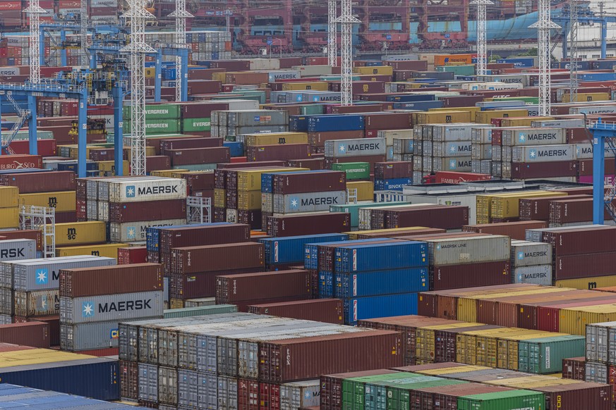 epa09257510 Shipping containers are seen in the Ningbo Zhoushan Port in Ningbo, Zhejiang province, China, 09 June 2021. The Ningbo-Zhoushan is a port that claims to be the busiest in the world in term ...