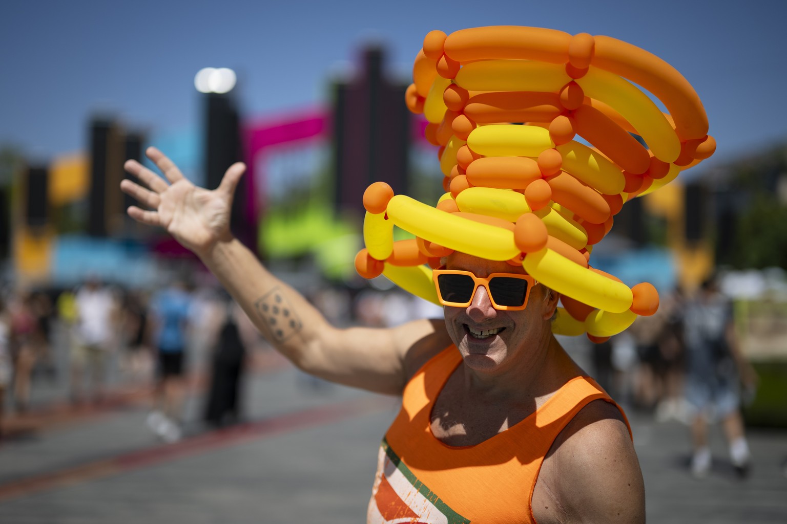 epa13156506 A participant attends the 33rd Street Parade in the city center of Zurich, Switzerland, 08 August 2026. The annual dance music event runs this year under the theme 'Together we move.& ...