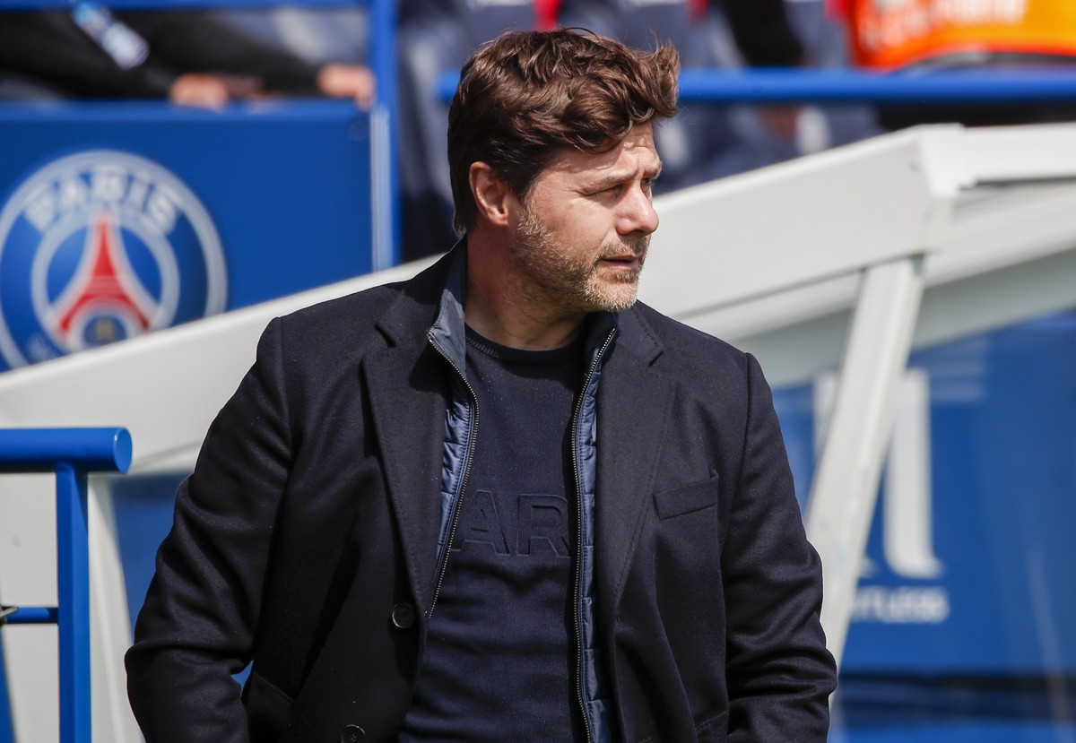 PSG's head coach Mauricio Pochettino watches play during the French League One soccer match between Paris Saint-Germain and St Etienne at Parc Des Princes in Paris, France, Sunday, April 18, 2021 ...