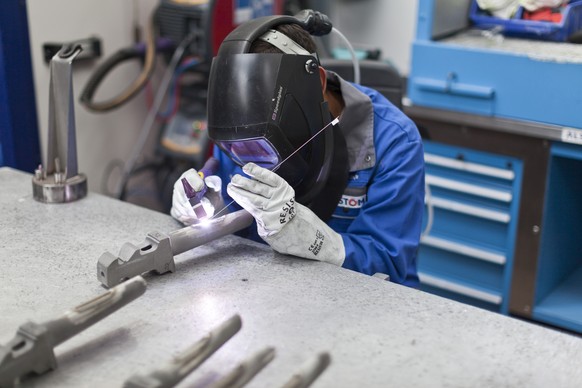 Alstom concern in Birr, canton of Aargau, Switzerland. Production hall of Alstom. Pictured on August 22, 2012. The Alstom repair service is checking the pieces that have to be repaired. The Swiss Alst ...