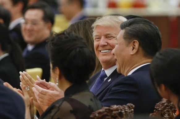 U.S. President Donald Trump and China&#039;s President Xi Jinping attend at a state dinner at the Great Hall of the People in Beijing, China, Thursday, Nov. 9, 2017. (Thomas Peter/Pool Photo via AP)