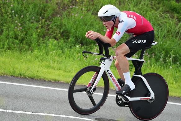 epa09372877 Stefan Kueng of Switzerland competes in the Men&#039;s Road Cycling Time Trial at the Tokyo 2020 Olympic Games at the Fuji International Speedway in Oyama, Japan, 28 July 2021. EPA/CHRISTO ...
