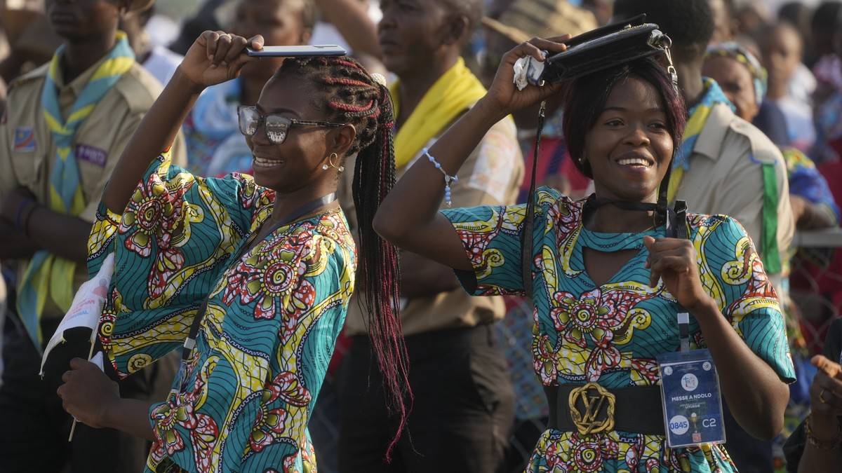 Faithful wait at Ndolo airport where Pope Francis will preside over the Holy Mass in Kinshasa, Congo, Wednesday Feb. 1, 2023. Francis is in Congo and South Sudan for a six-day trip, hoping to bring co ...