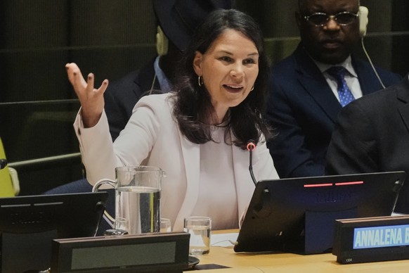 Germany acting Foreign Minister Annalena Baerbock delivers her remarks during an informal interactive dialogue in the Trusteeship Council Chamber, at United Nations headquarters, Thursday, May 15, 202 ...