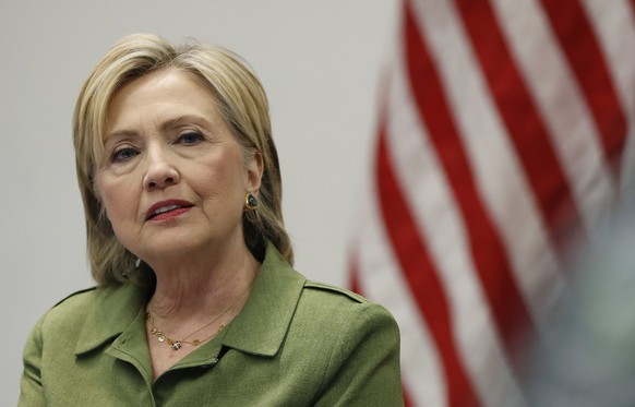 In this photo taken Aug. 18, 2016, Democratic presidential candidate Hillary Clinton speaks to media as she meets with law enforcement leaders at John Jay College of Criminal Justice in New York. Whil ...