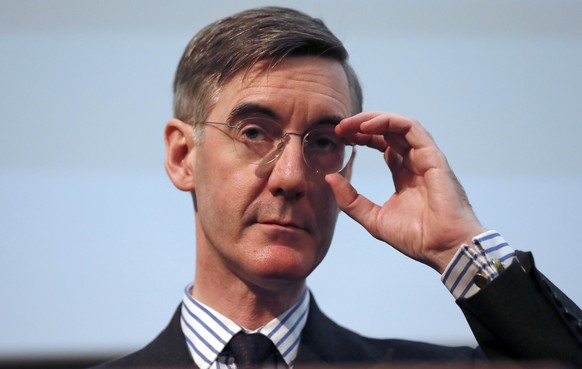 British lawmaker Jacob Rees-Mogg gestures as he speaks at a meeting for eurosceptic think tank The Bruges group, in London, Wednesday, Jan. 23, 2019. (AP Photo/Alastair Grant)