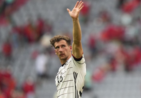 Germany&#039;s Leon Goretzka, left, and Germany&#039;s Mats Hummels celebrate after the Euro 2020 soccer championship group F match between Portugal and Germany in Munich, Saturday, June 19, 2021. (AP ...