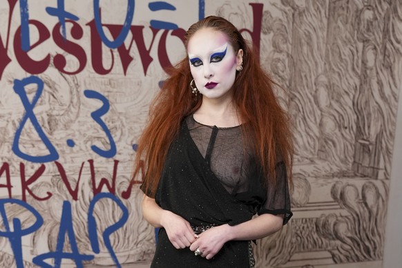 EDS NOTE: NUDITY - Chappell Roan poses for photographers during the photo call for the Vivienne Westwood Fall/Winter 2025-2026 Womenswear collection presented in Paris, Saturday, March 8, 2025. (Photo ...