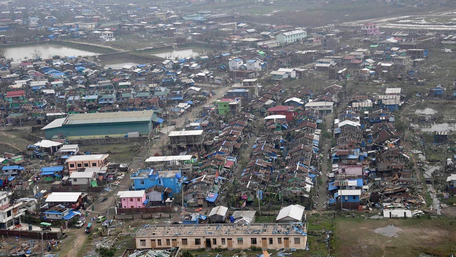 epa10629989 A handout photos made available by the Myanmar Military Information team shows an aerial view of damage buildings after cyclone Mocha made landfall in Sittwe, Rakhine State, Myanmar, 15 Ma ...