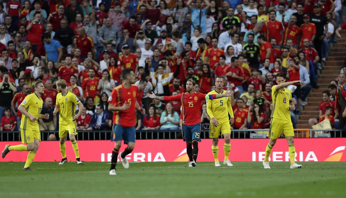 Spain's Sergio Ramos, center, gestures during the Euro 2020 Group F qualifying soccer match between Spain and Sweden at the Santiago Bernabeu stadium in Madrid, Monday June 10, 2019. (AP Photo/Ma ...