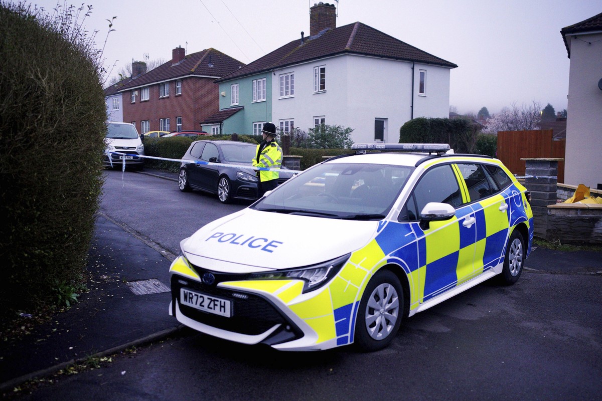 Police work at the scene in Blaise Walk, in Sea Mills, Bristol, England, where a woman has been arrested on suspicion of murder after three children were found dead at a property, Sunday, Feb. 18, 202 ...