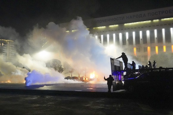 FILE - Riot police prepare to block protesters in the center of Almaty, Kazakhstan, Jan. 5, 2022. On Jan. 2, small protests broke out in an oil city in western Kazakhstan where residents were unhappy  ...