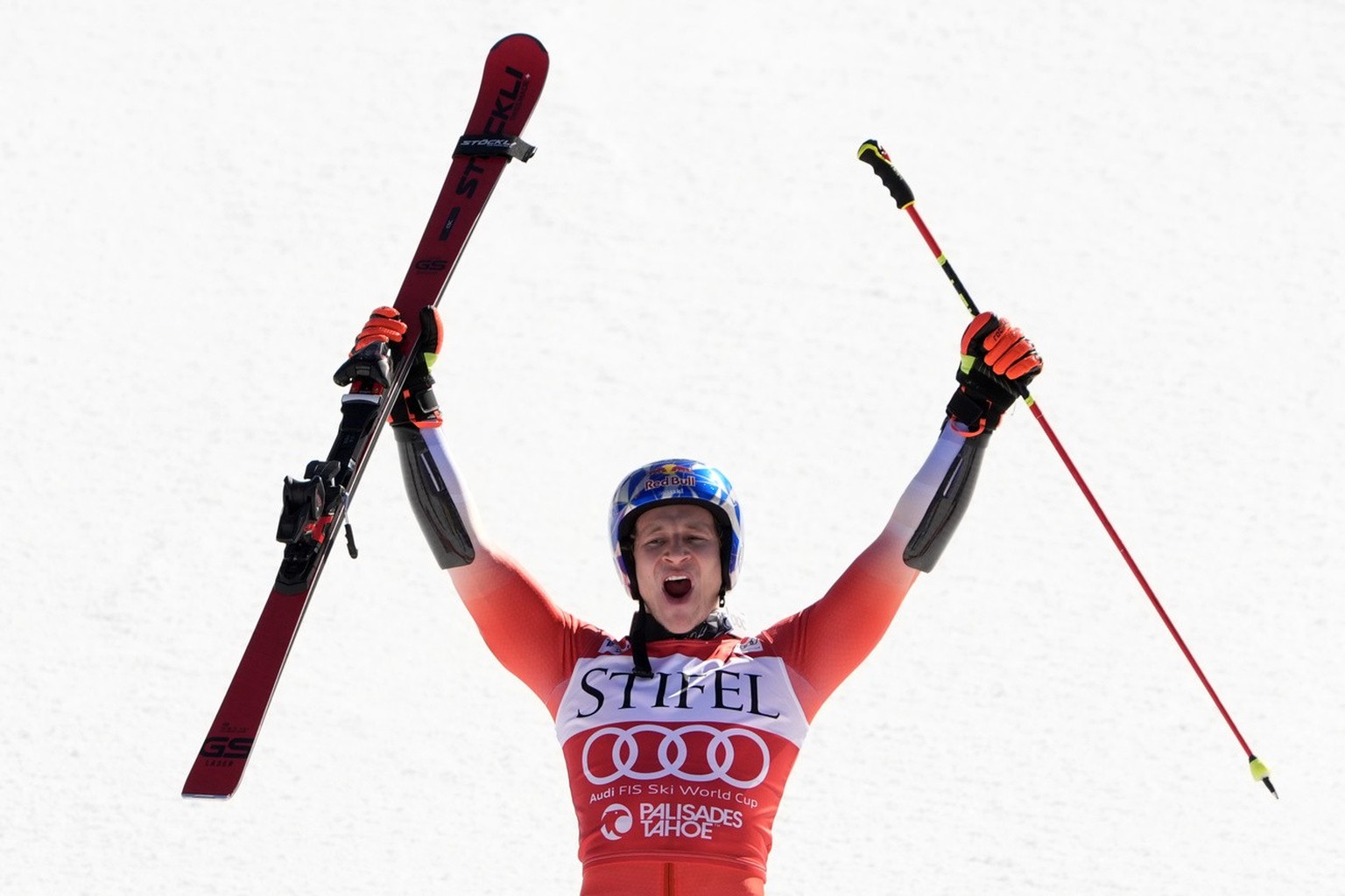 Marco Odermatt, of Switzerland, celebrates his victory in men&#039;s World Cup giant slalom skiing race Saturday, Feb. 24, 2024, at Palisades Tahoe ski resort in Lake Tahoe, Calif. (AP Photo/Robert F. ...