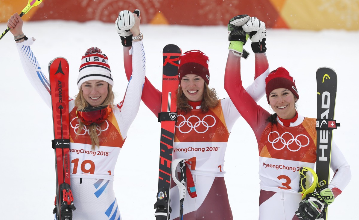 epa06552541 (L-R) Silver medal winner Mikaela Shiffrin of the USA, Gold medal winner Michelle Gisin of Switzerland and Bronze medal winner Wendy Holdener of Switzerland celebrate during the Slalom por ...
