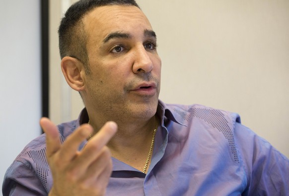 In this March 27, 2014 photo, Alki David, CEO of FIlmOn, is interviewed at The Associated Press in New York. FilmOn offers over-the-air TV channels through a website and mobile apps. (AP Photo/Mark Le ...