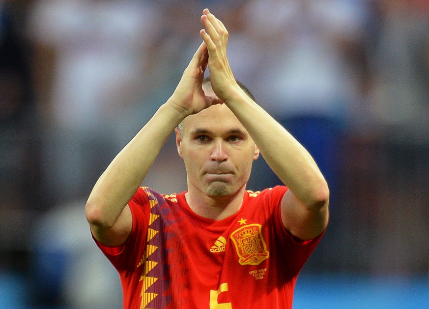 epa06855853 Andres Iniesta of Spain applauds fans after the penalty shootout of the FIFA World Cup 2018 round of 16 soccer match between Spain and Russia in Moscow, Russia, 01 July 2018. Russia won 4- ...