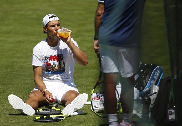 Spain&#039;s Rafael Nadal takes a break during a practice session ahead of the Wimbledon Tennis Championships in London, Sunday, July 2, 2017. (AP Photo/Alastair Grant)