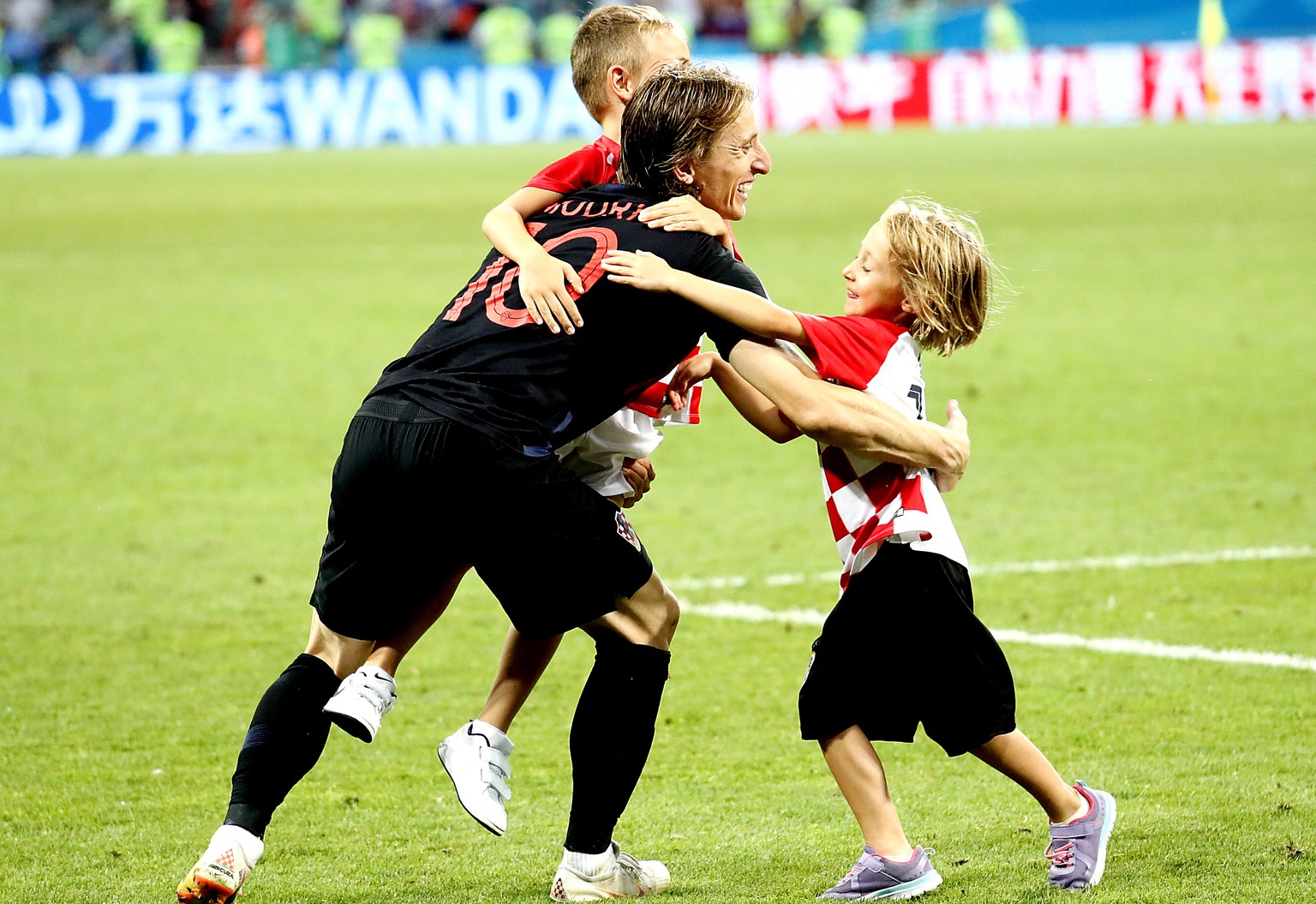 epa06872907 Luka Modric (C) of Croatia celebrates with his son Ivano (L) and his daughter Ema (R) after the FIFA World Cup 2018 quarter final soccer match between Russia and Croatia in Sochi, Russia,  ...