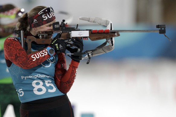 Switzerland&#039;s Irene Cadurisch aims her rifle during a biathlon training session, at the 2018 Winter Olympics in Pyeongchang, South Korea, Monday, Feb. 19, 2018. (AP Photo/Andrew Medichini)