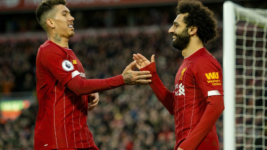 epa08185489 Liverpool&#039;s Mohamed Salah celebrates after scoring the third goal making the score 3-0 during the English Premier League soccer match between Liverpool and Southampton at Anfield, Liv ...