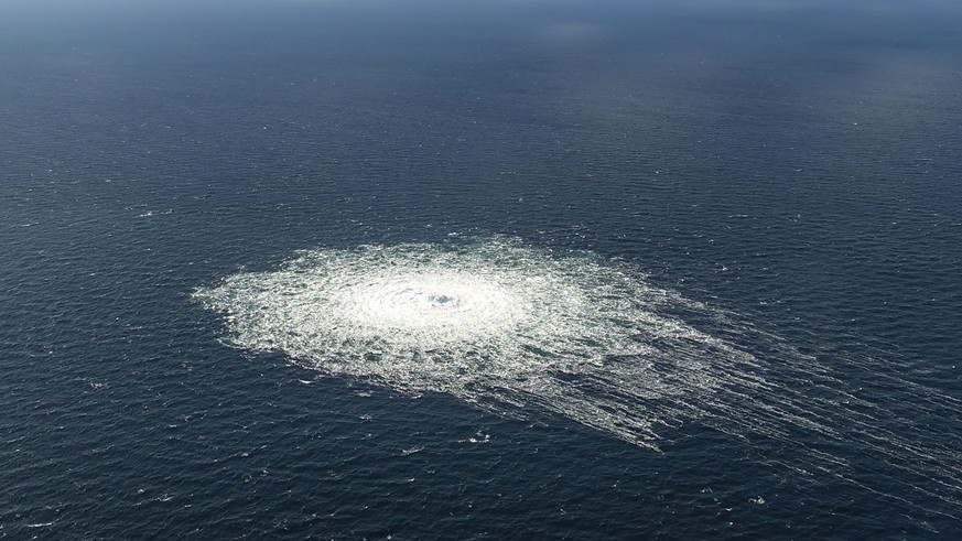 A large disturbance in the sea can be observed off the coast of the Danish island of Bornholm Tuesday, Sept. 27, 2022 following a series of unusual leaks on two natural gas pipelines running from Russ ...